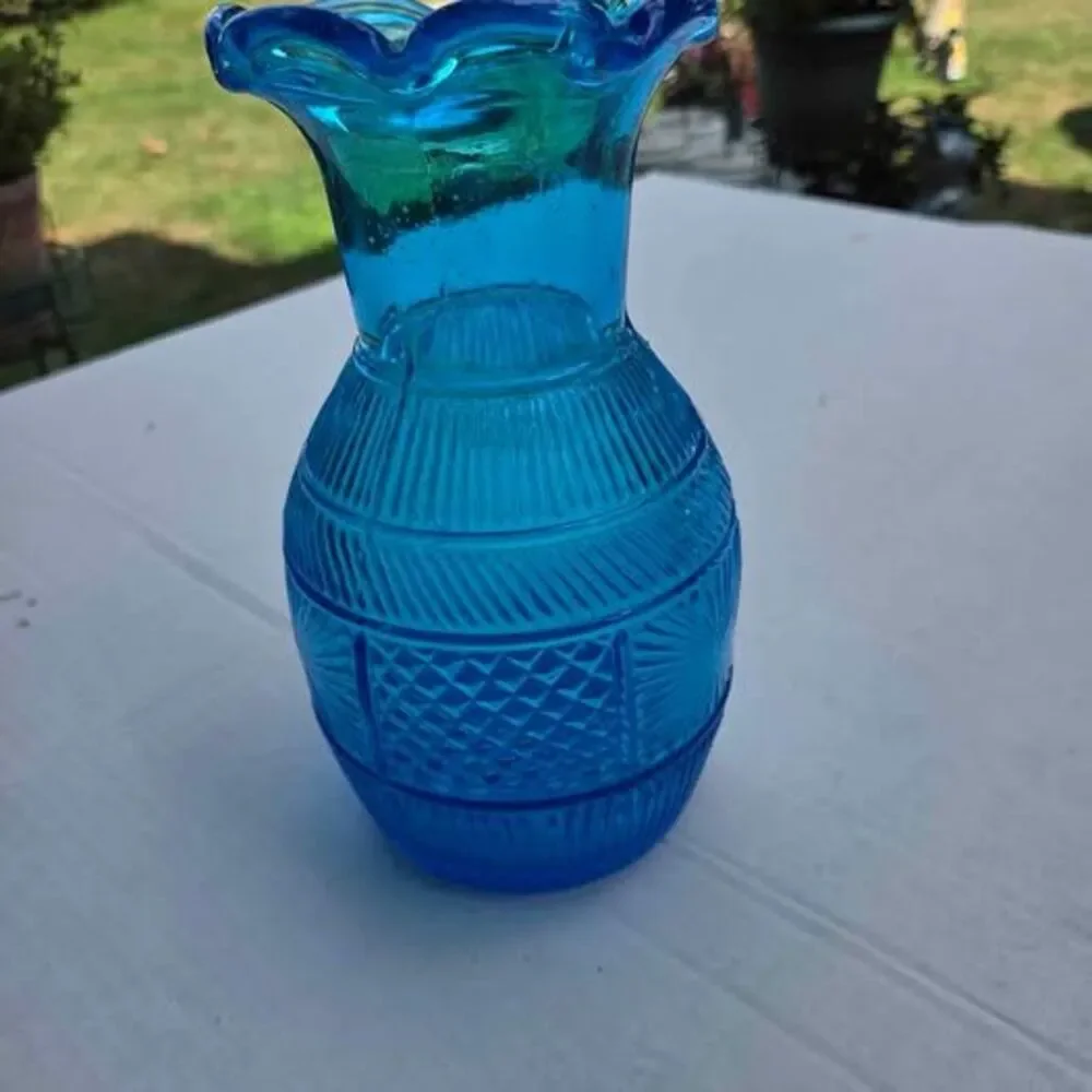 Vintage Clevenger Bros vase in light blue